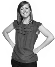  Woman smiling with hands on hips