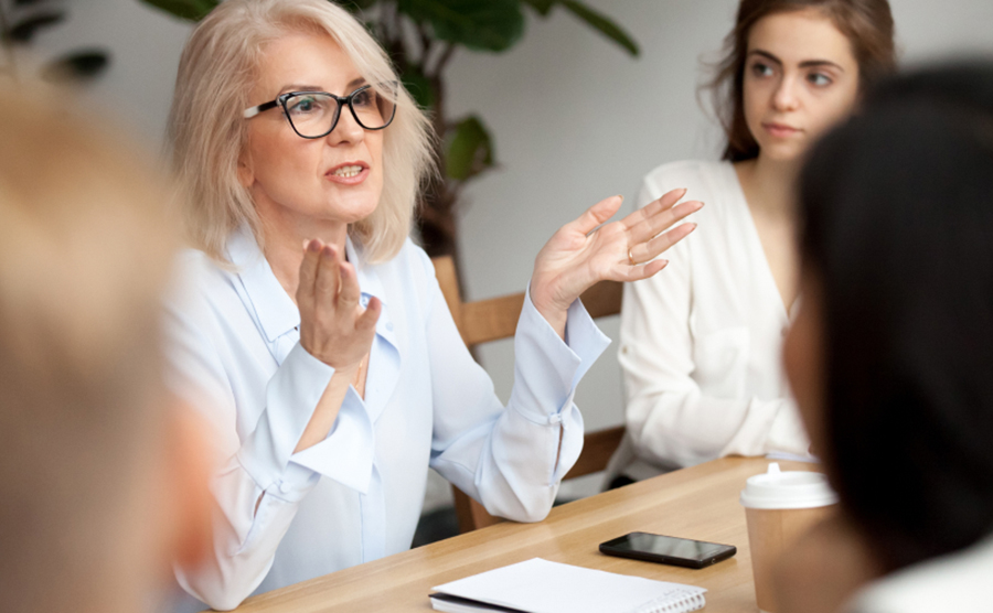 Woman speaking in meeting