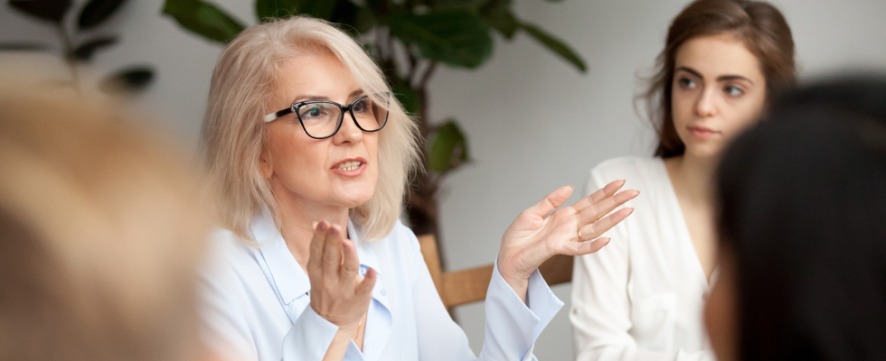 Woman speaking in meeting