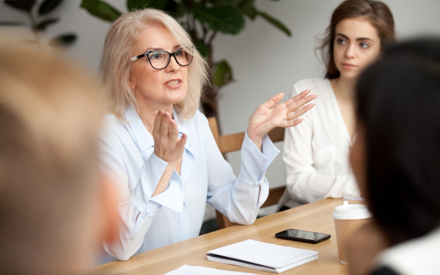 Woman speaking in meeting