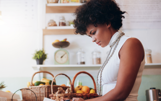 Woman standing in kitchen