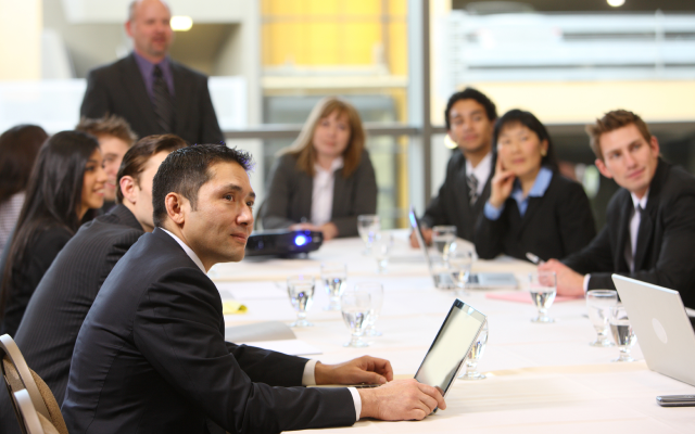 People listening in meeting