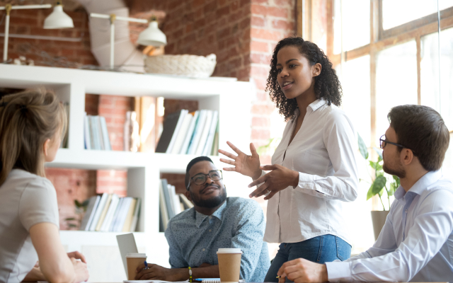 Woman speaking in meeting