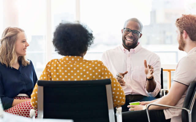 People chatting in meeting