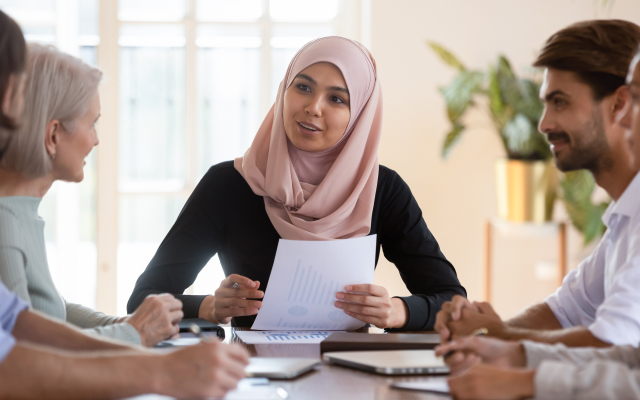 Woman speaking at a meeting