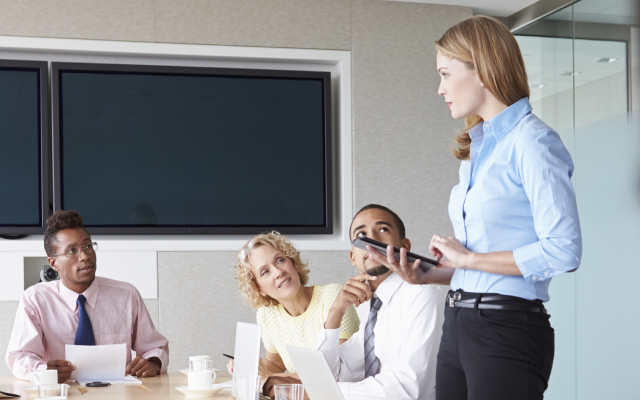 Woman speaking in a meeting