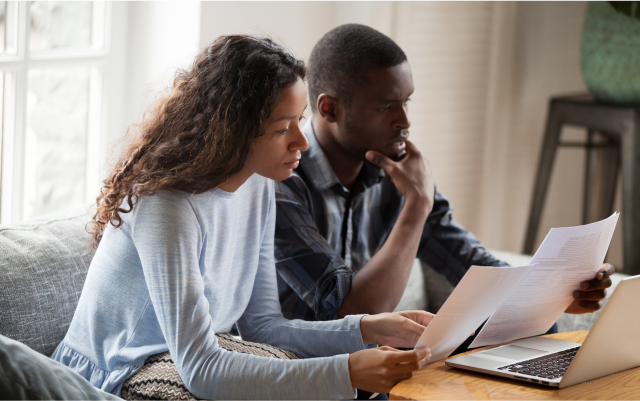 Man and woman looking at paperwork