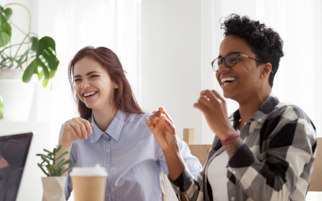 Two women smiling