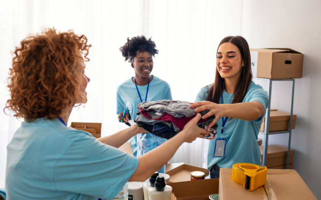 Women folding clothes