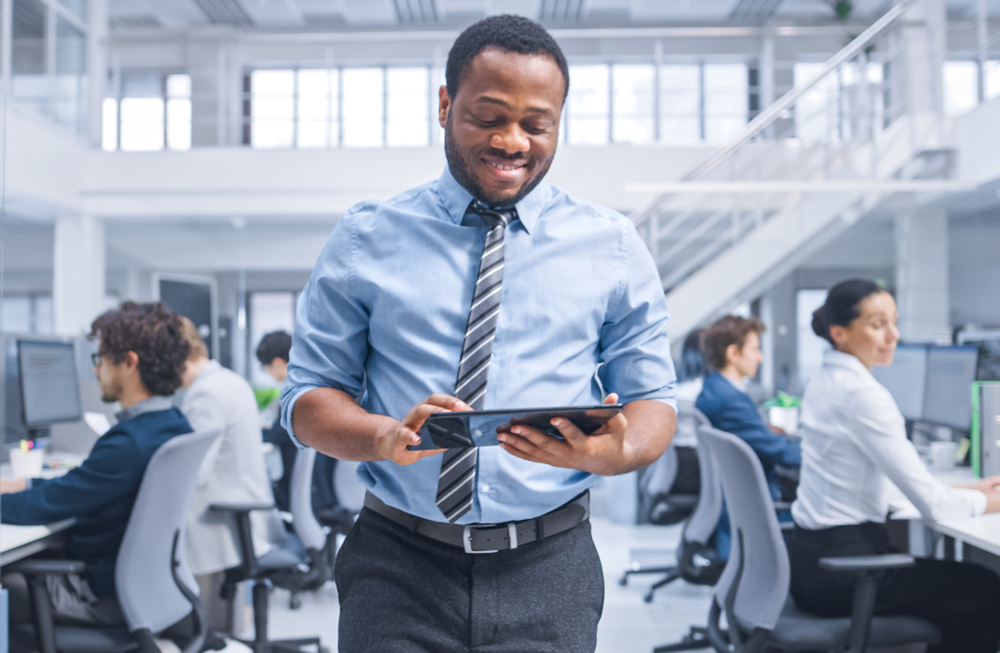 Man looking at tablet in office