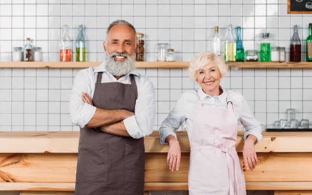 Man and woman standing in kitchen