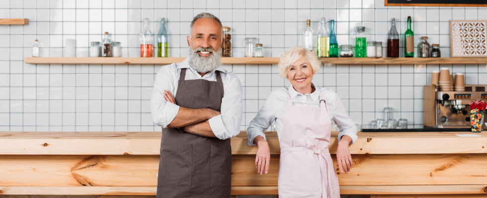 Man and woman standing in kitchen