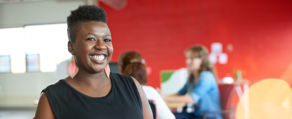 Woman in an office smileing