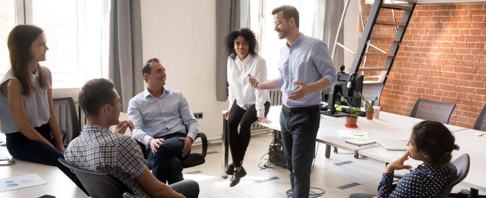 Group of people sitting together talking