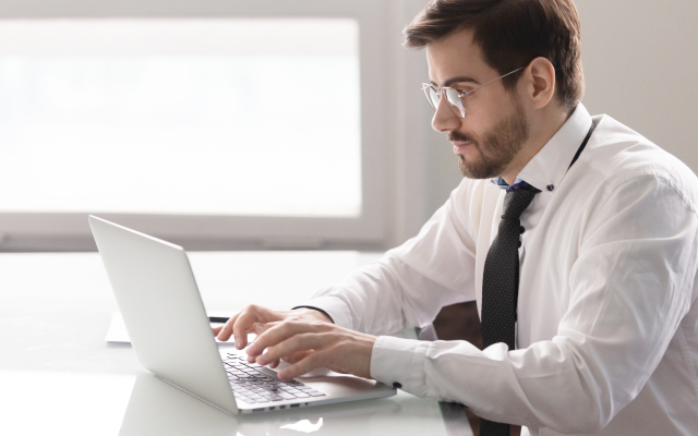 man working on laptop