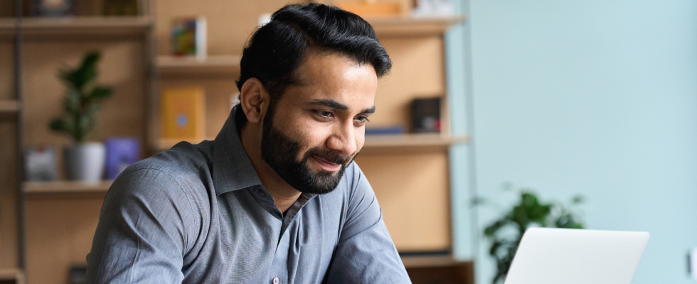 Man looking at laptop