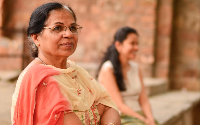 Older woman with a younger woman in the background